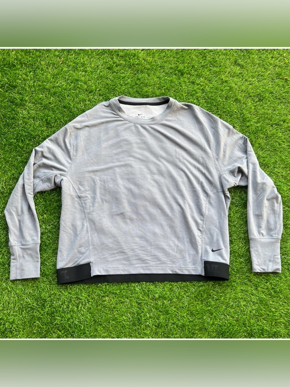 Nike Women's Light Gray Long Sleeve Crew with Black Hem